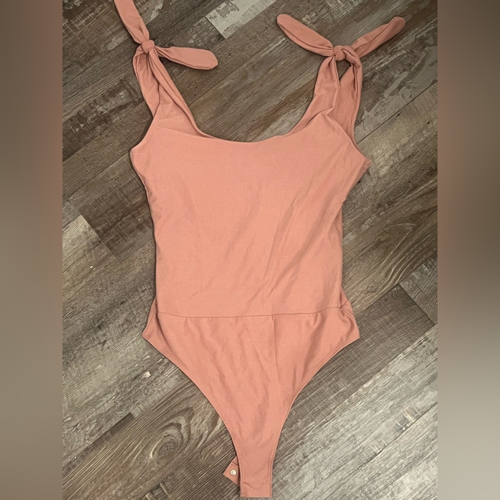 Lulu's Pink Asymmetrical Cut Out Bodysuit